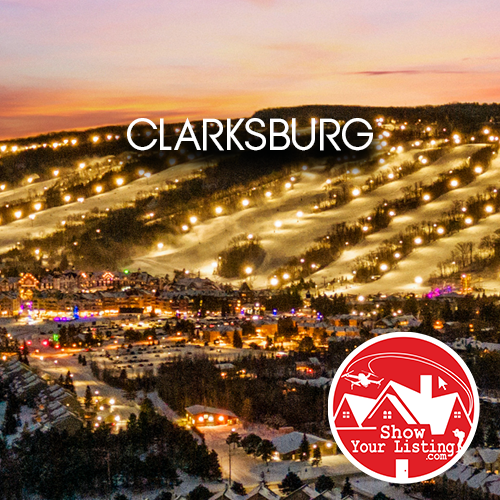 Stunning aerial view of Thornbury and Clarksburg highlighting fine dining, vibrant galleries, and the beautiful beach, ideal for real estate media showcasing this charming community.