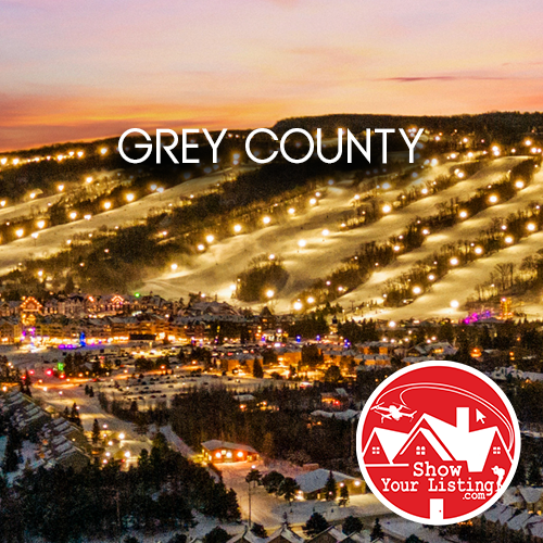 Captivating aerial view of Grey County showcasing picturesque landscapes, vibrant communities, ideal for real estate photography, highlighting four-season beauty and outdoor lifestyle activities.