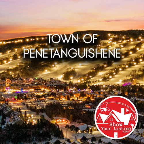 Stunning drone view of Penetanguishene, Ontario, showcasing Georgian Bay, perfect for real estate photography and tourism promotional purposes.